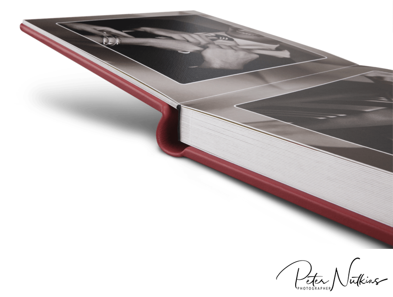 A Wedding Album Showing The Thickness Of The Pages - Blue Eye Picture - Photographer Dubai Transparent PNG - 800x605 - Free Download on - Wedding Transparent PNG Free Download